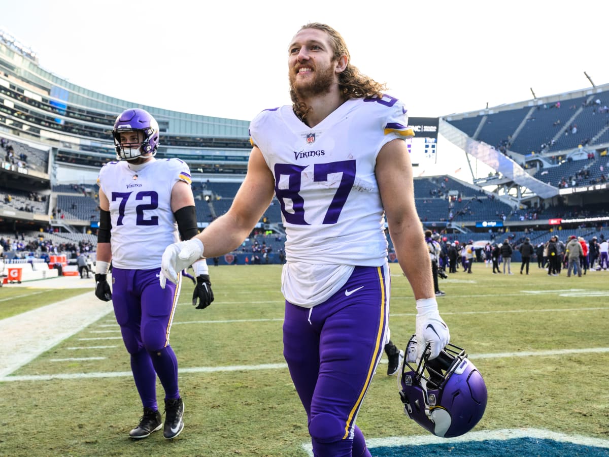 Minnesota Vikings tight end T.J. Hockenson (87) running with the ball  before the start of an