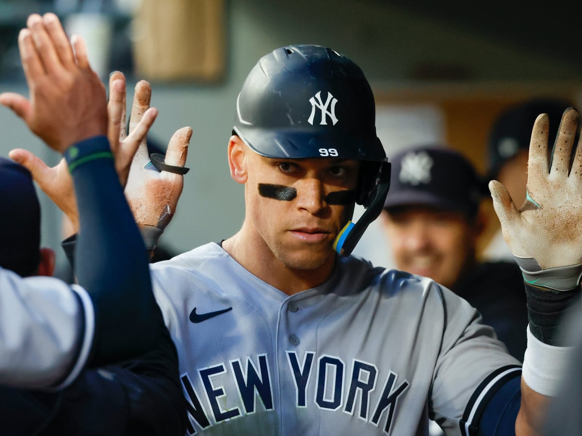 American League's Aaron Judge, of the New York Yankees, walks back to the  dugout after striking out during the third inning of the MLB All-Star  baseball game against the National League, Tuesday