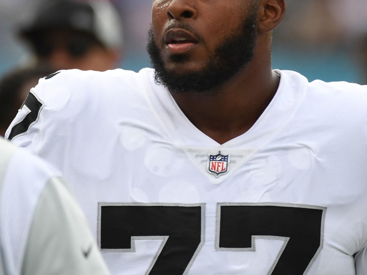 NASHVILLE, TN - SEPTEMBER 25: Las Vegas Raiders offensive tackle Thayer  Munford Jr. (77) looks on during warmups before the game between the  Tennessee Titans and the Las Vegas Raiders on September