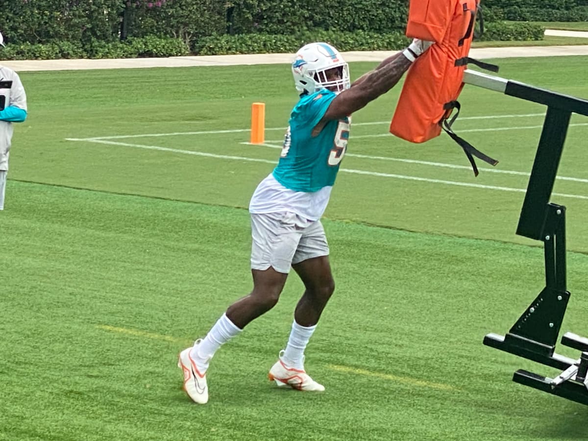 Miami Dolphins cornerback Kader Kohou does drills during practice