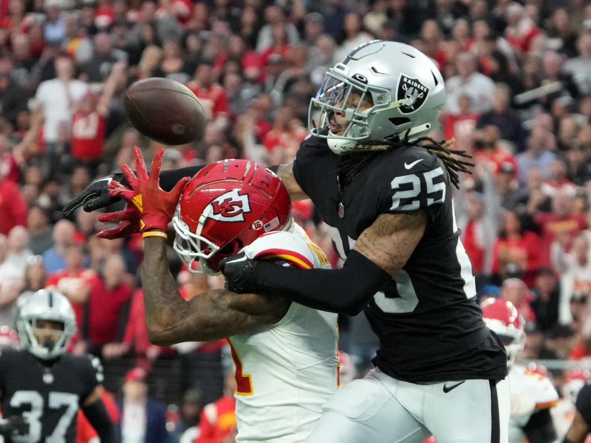 Raiders safety Trevon Moehrig (25) makes a leaping catch during a special  training camp practic …