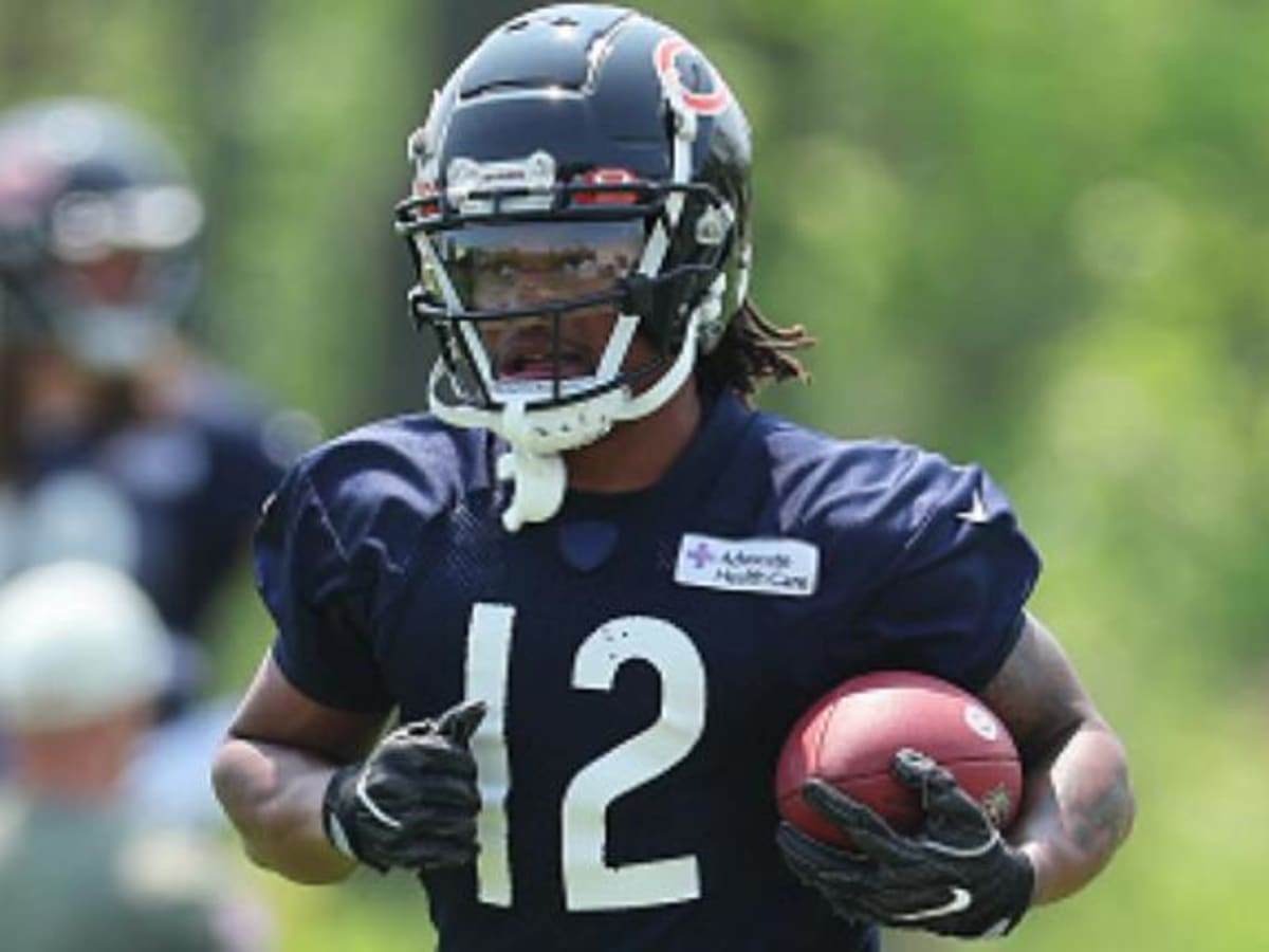 Bears rookie punt returner Devin Hester runs back a punt during