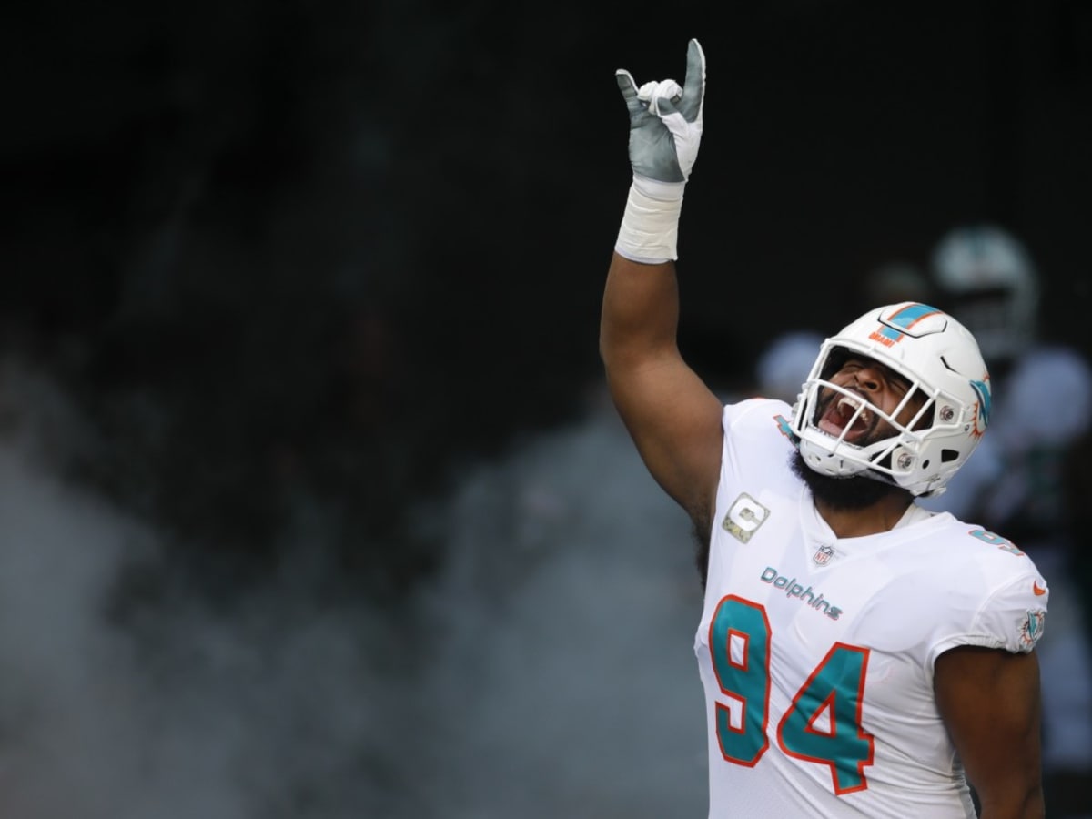 Miami Dolphins defensive tackle Christian Wilkins (94) laughs on the  sidelines during an NFL football game against the Philadelphia Eagles,  Saturday, Aug. 27, 2022, in Miami Gardens, Fla. (AP Photo/Doug Murray Stock