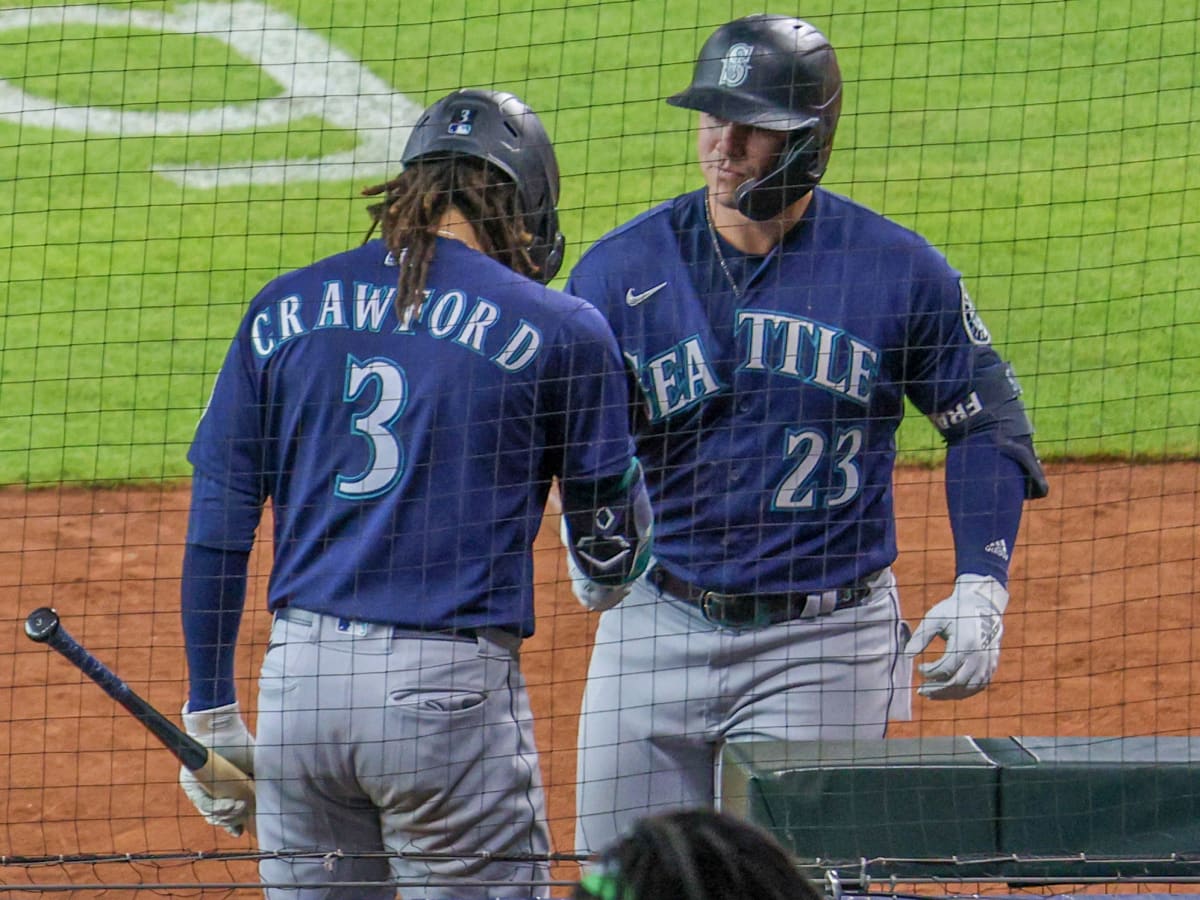 Seattle Mariners' Ty France looks down after striking out to end