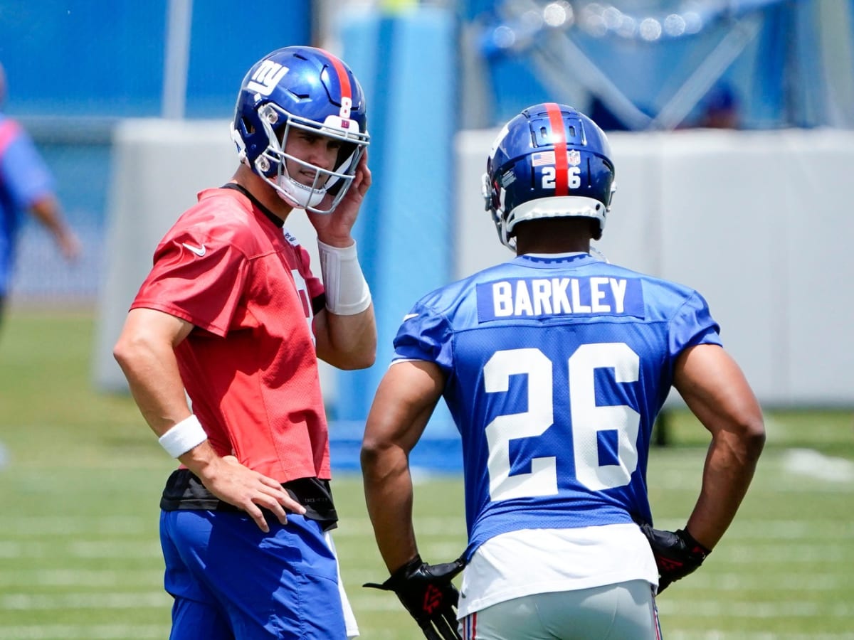 New York, USA. August 8, 2019, East Rutherford, New Jersey, USA: New York  Giants quarterback Daniel Jones (8) celebrates with running back Saquon  Barkley (26) after throwing his first touchdown pass during