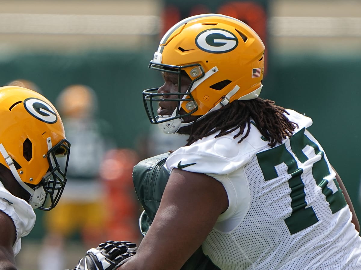 Green Bay Packers offensive tackle Caleb Jones (72) lines up for the play  during a preseason