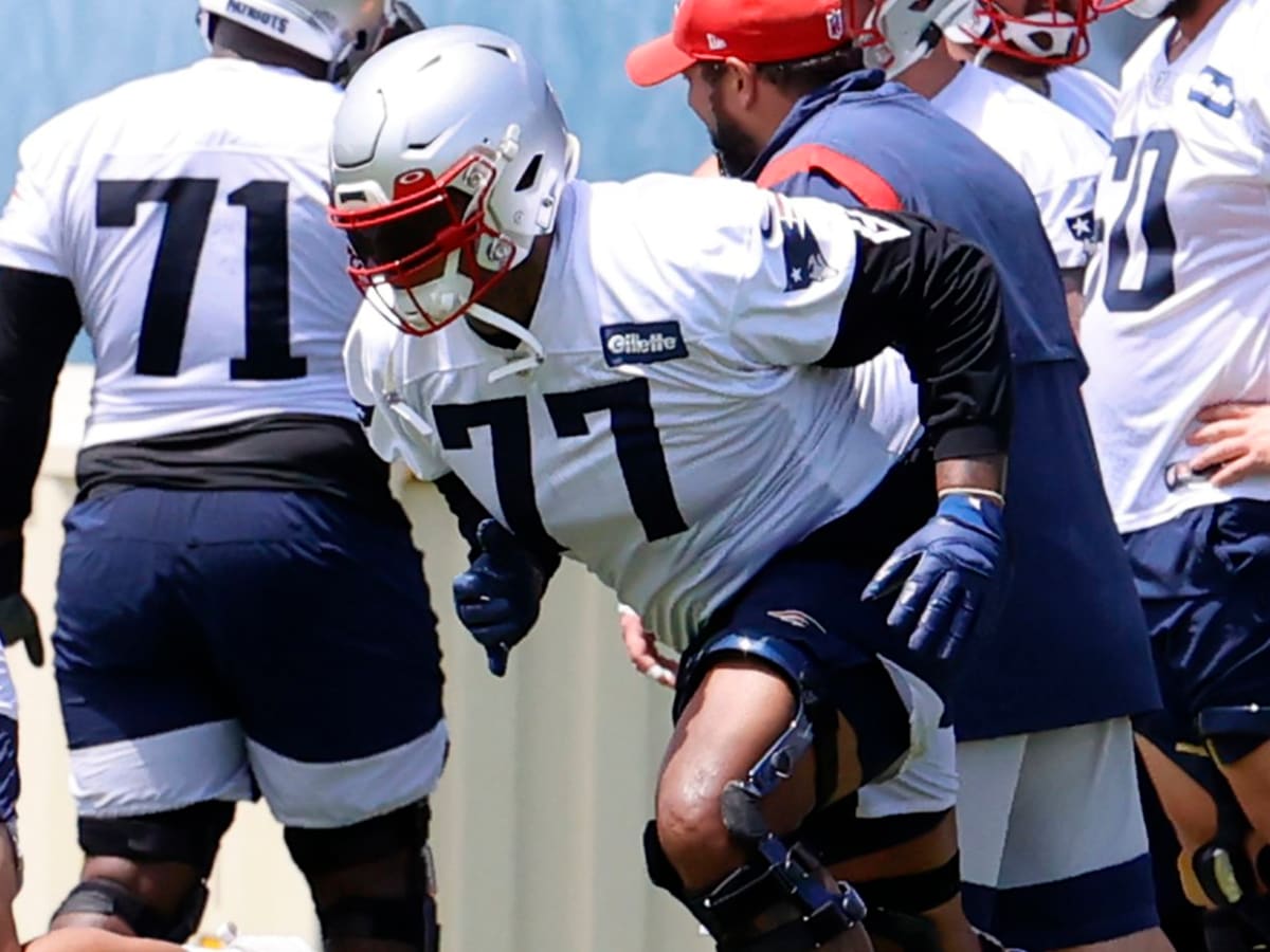 New England Patriots offensive lineman Trent Brown (77) stands on the  sidelines during an NFL football game against the Miami Dolphins Sunday,  Sept. 11, 2022, in Miami Gardens, Fla. (AP Photo/Doug Murray