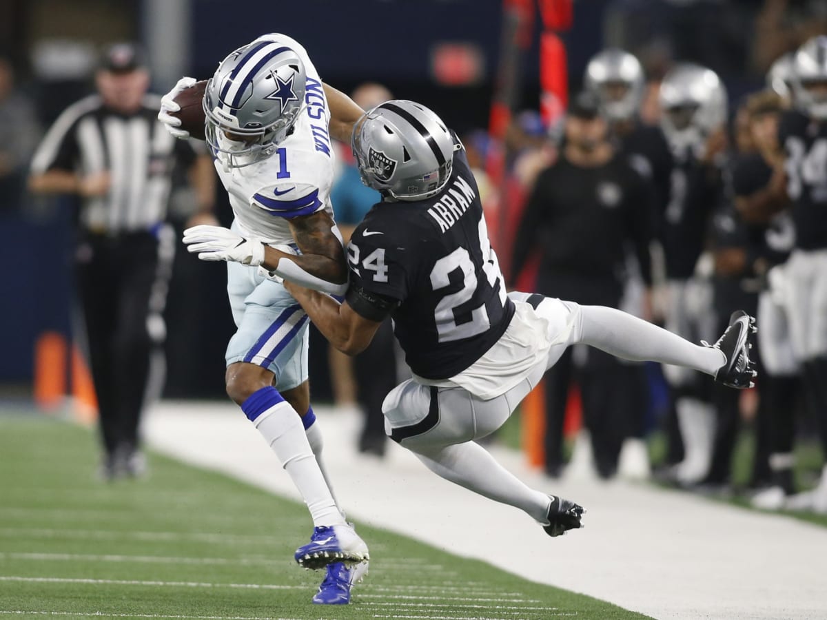 Raiders safety Trevon Moehrig (25) adjusts his head wrap during their NFL  training camp practic …