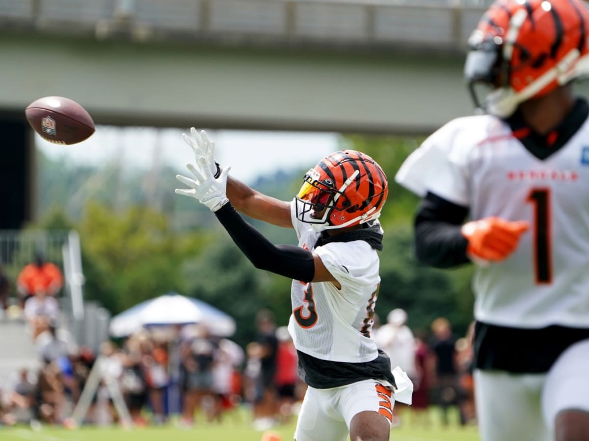 Cincinnati Bengals' Chase Brown carries the ball during a drill at