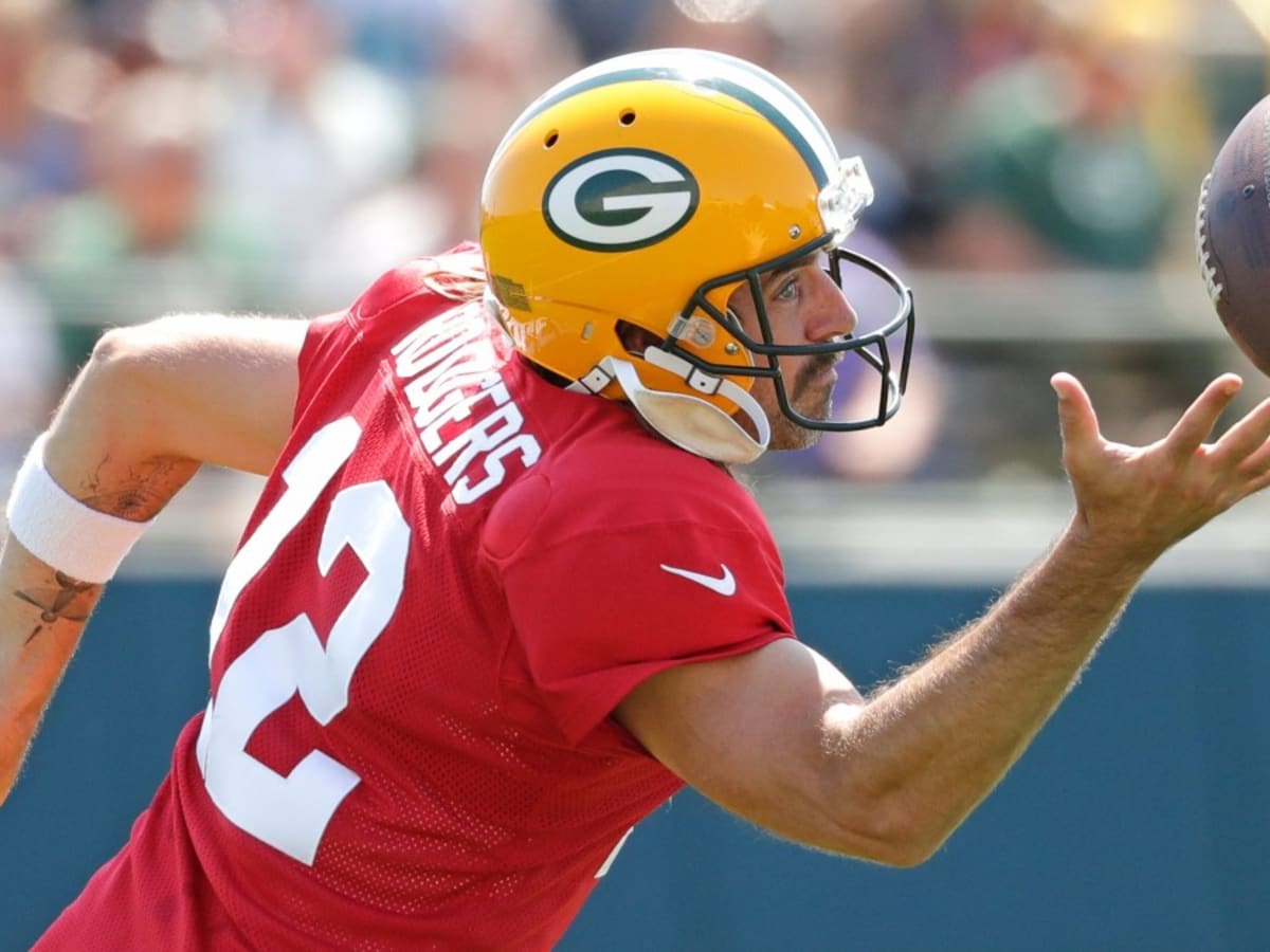 Aaron Rodgers' rift with Packers deepens as QB skips mandatory training  camp, Green Bay Packers