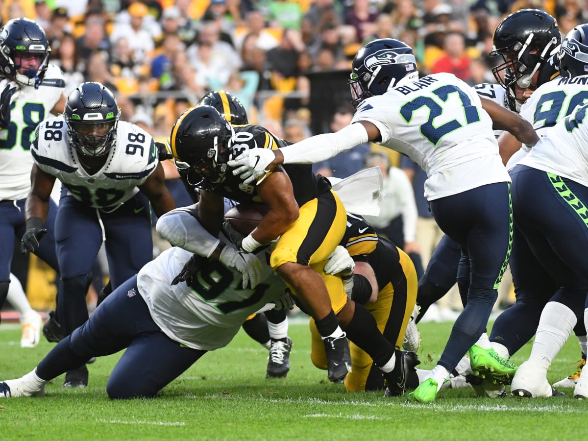 Seattle Seahawks running back Kenneth Walker III celebrats during an NFL  preseason football game against the Dallas Cowboys, Saturday, Aug. 19,  2023, in Seattle. The Seahawks won 22-14. (AP Photo/Stephen Brashear Stock