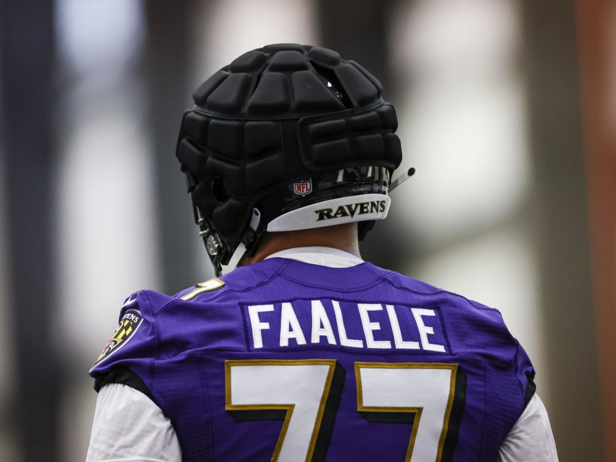 Baltimore Ravens offensive tackle Daniel Faalele takes the field