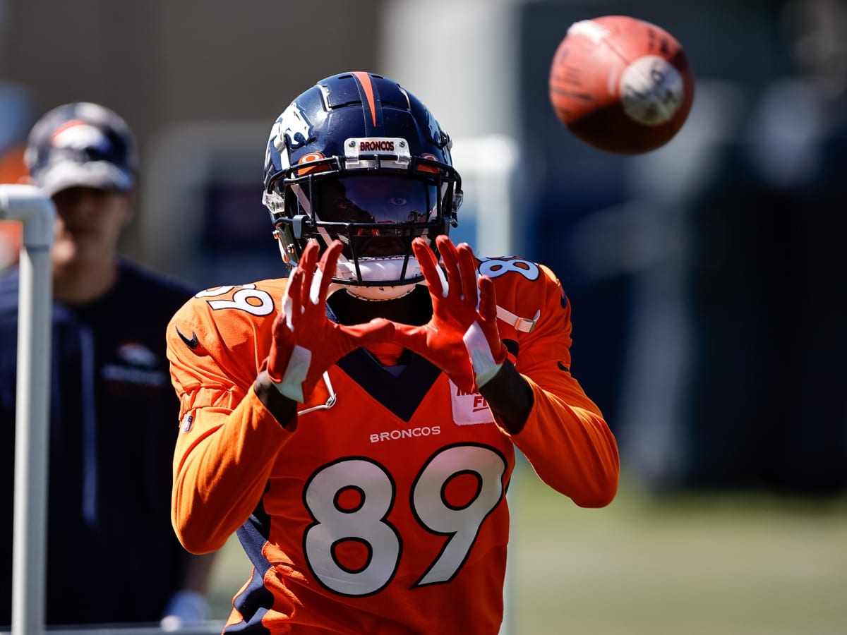 Denver Broncos rookie wide receiver Brandon Johnson takes part in drills  during the NFL football team's training camp Tuesday, Aug. 2, 2022, at the  Broncos' headquarters in Centennial, Colo. (AP Photo/David Zalubowski