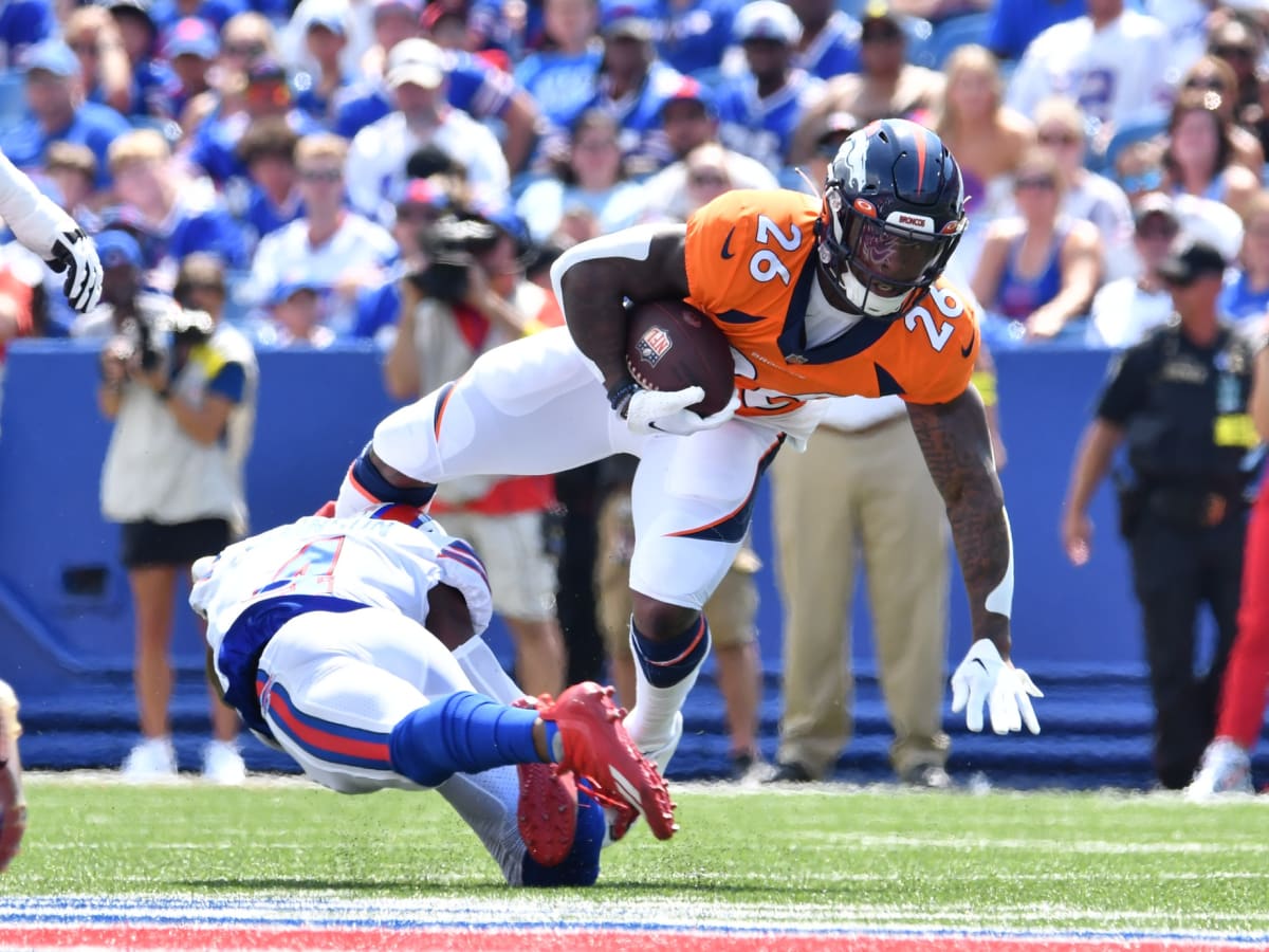 A kids holds a sign during the second half of a preseason NFL football game  between the Buffalo Bills and the Denver Broncos, Saturday, Aug. 20, 2022,  in Orchard Park, N.Y. (AP