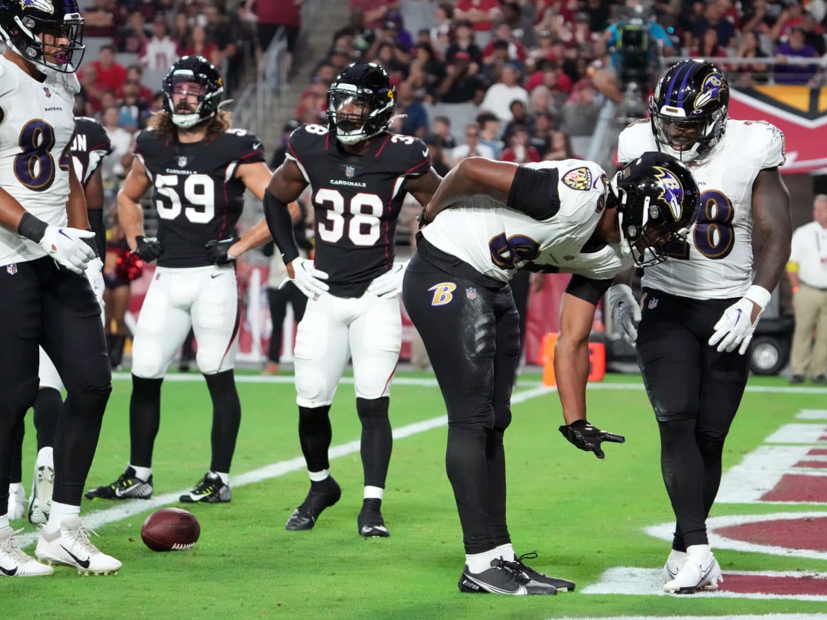 Washington Commanders WR Dyami Brown (2) catches a pass while being  defended by Baltimore Ravens DB Brandon Stephens (21) during a preseason  game at M&T Bank Stadium in Baltimore, Maryland on August