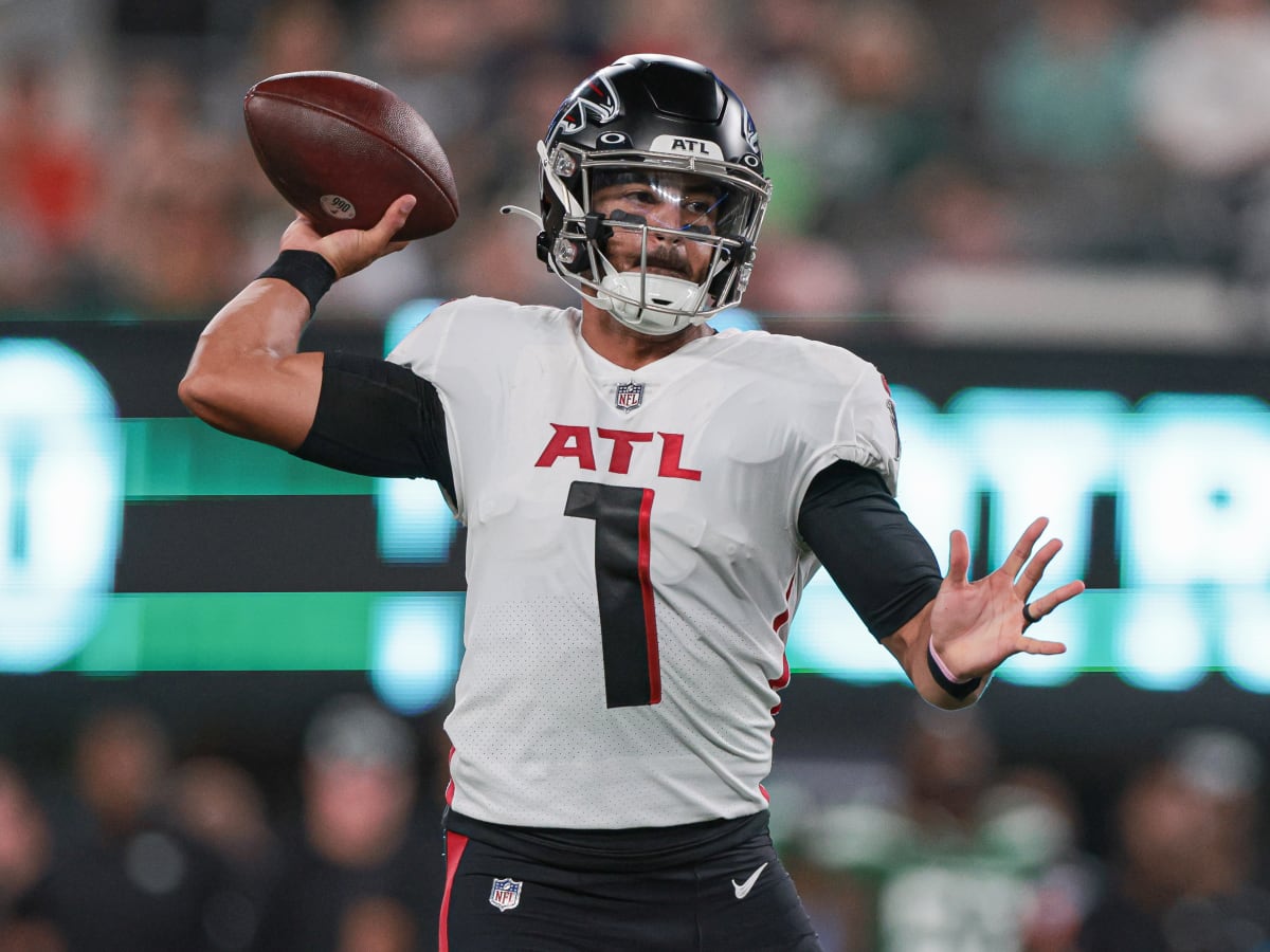 Atlanta Falcons quarterback Marcus Mariota (1) runs the ball during  overtime of an NFL football game