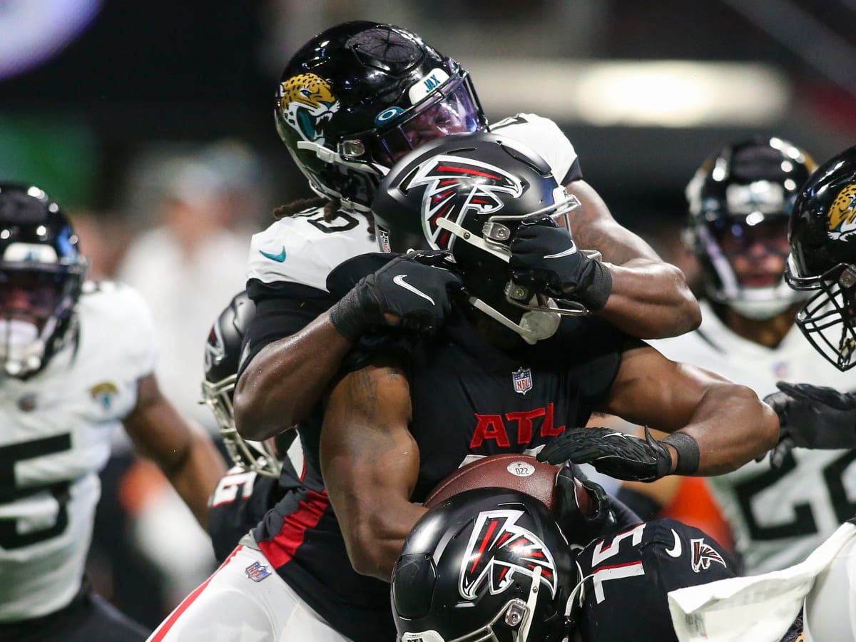 Atlanta Falcons running back Caleb Huntley (42) runs the ball during the  second half of a preseason NFL football game against the Tennessee Titans,  Friday, Aug. 13, 2021, in Atlanta. The Tennessee