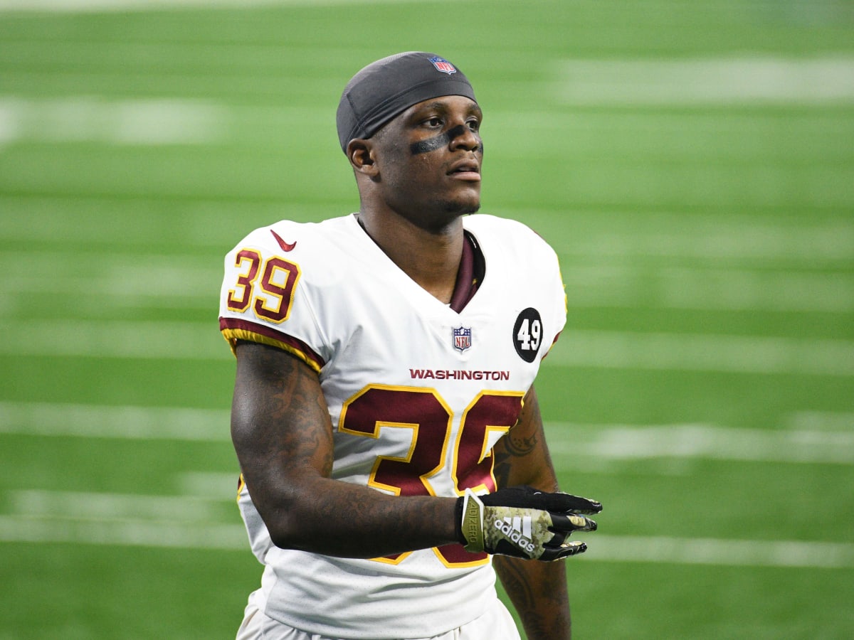 Washington Commanders safety Jeremy Reaves (39) runs during an NFL