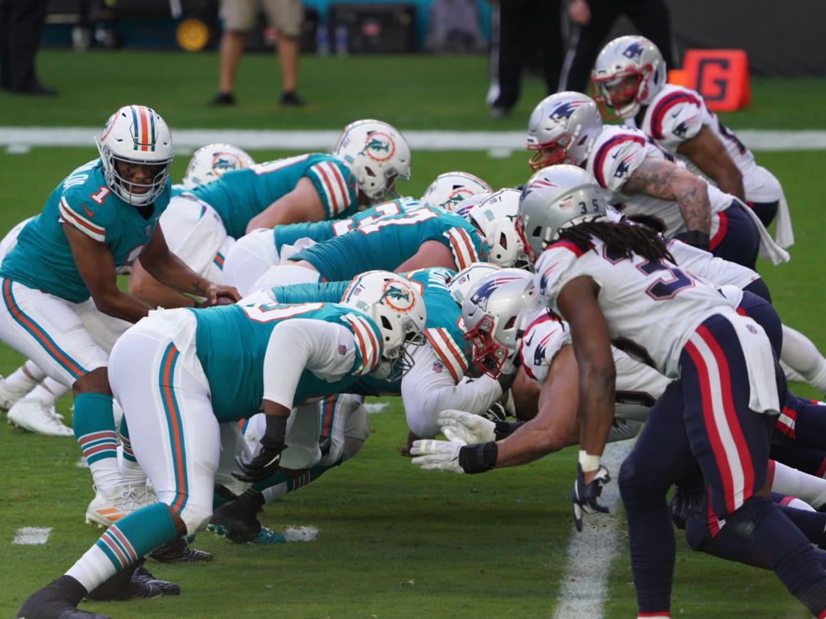 Dolphins beat Patriots on last-second lateral fiesta, touchdown