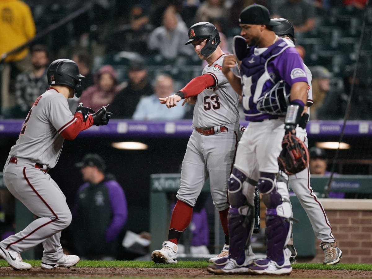 Rockies beat D-backs with five home runs, including a 504-foot blast by  C.J. Cron and a walk-off by Elias Diaz