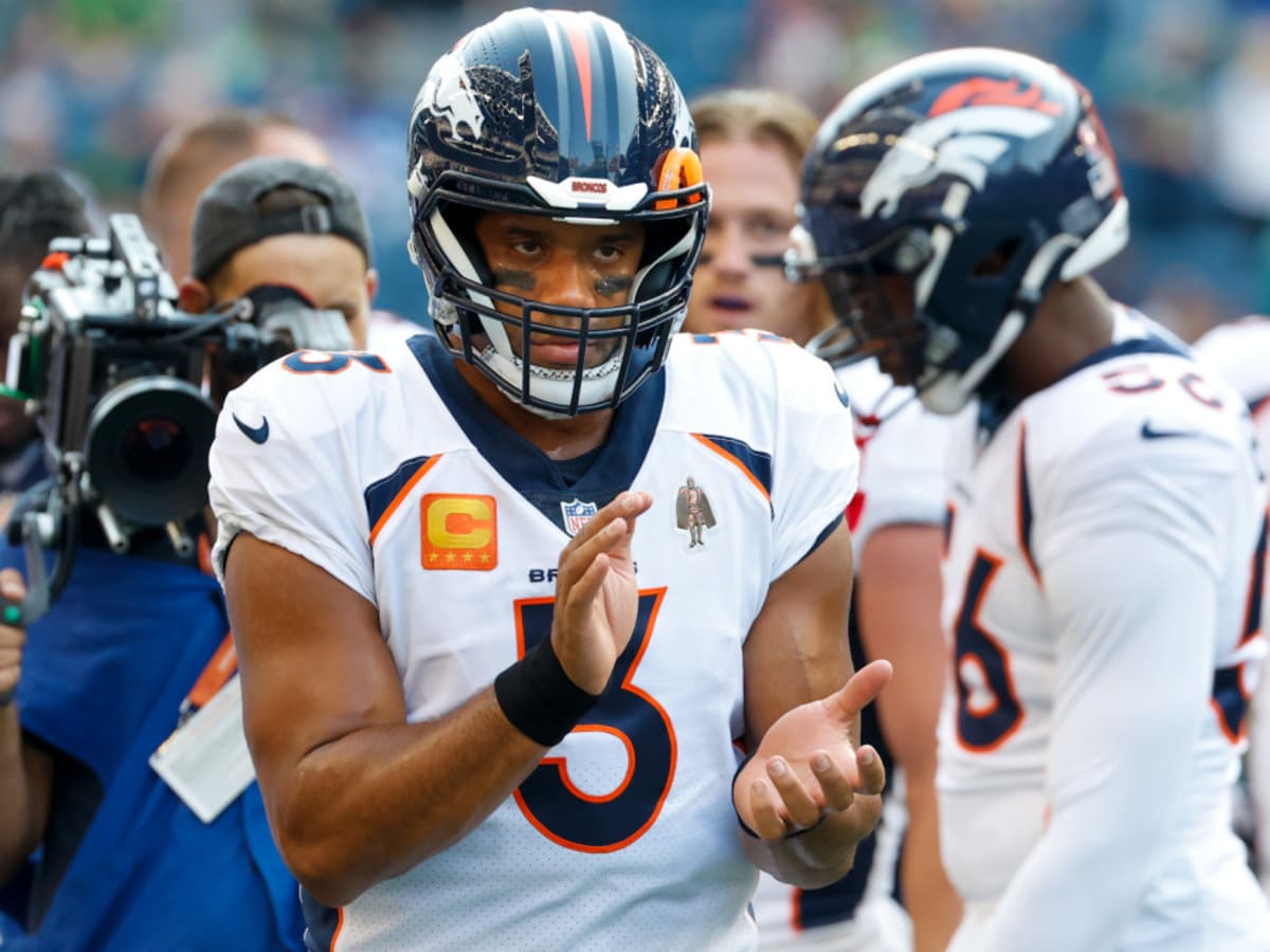 Broncos Russell Wilson greets some Seahawks, 1st fans in boo