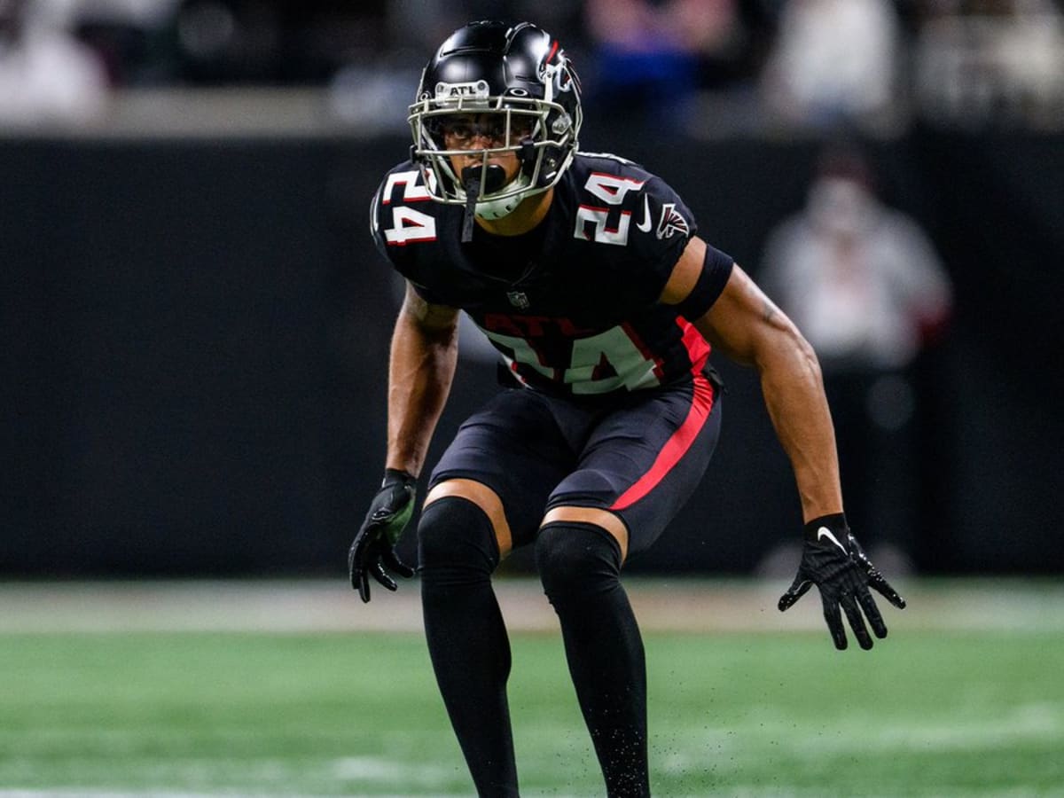 Atlanta Falcons cornerback A.J. Terrell leaps in front of New England  Patriots tight end Jonnu Smith to high-point interception