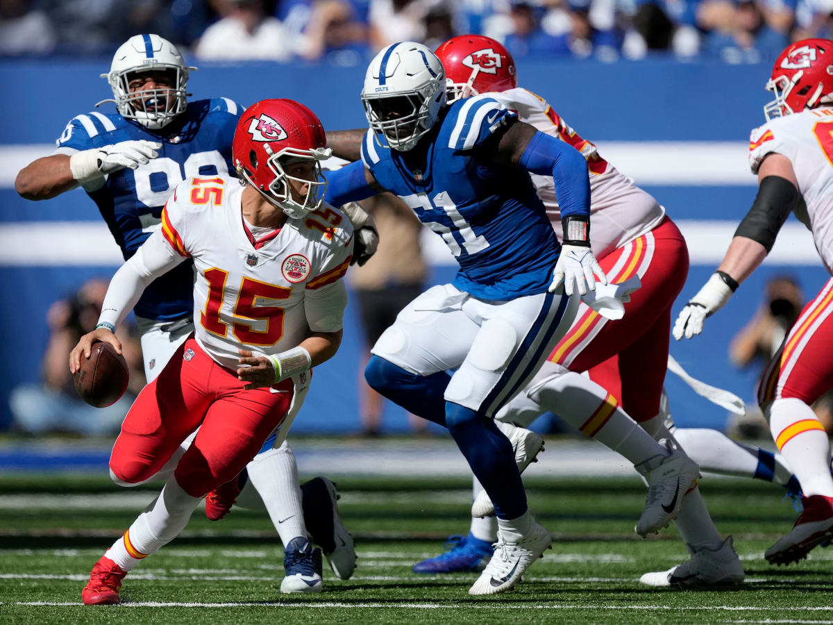 Indianapolis, Indiana, USA. 25th Sep, 2022. Indianapolis Colts defense and Kansas  City Chiefs offensive players wait out an instant replay in the sunny part  of the field during the game between the