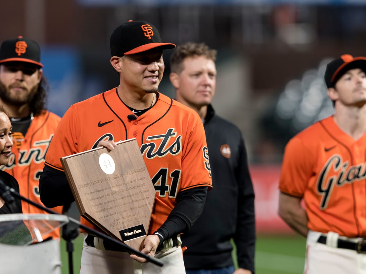 Former Willie Mac Award winners pose with @mm_duffy and Willie McCovey at  #attpark. Photo by @punkpo…