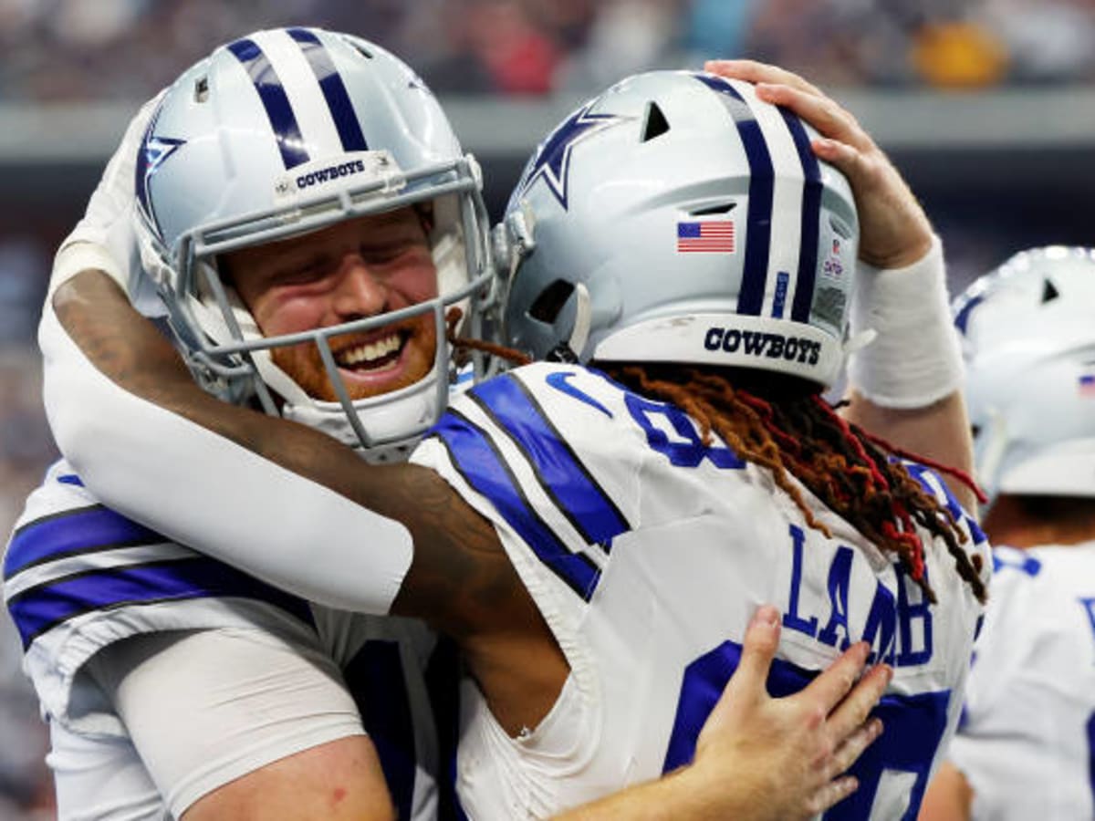 ARLINGTON, TX - DECEMBER 24: Dallas Cowboys quarterback Dak Prescott (4)  knees down for the final play of the game between the Dallas Cowboys and  the Philadelphia Eagles on December 24, 2022