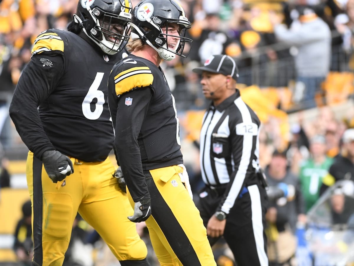 Pittsburgh quarterback Kenny Pickett (8) celebrates with head coach Pat  Narduzzi after scoring a touchdown in the second half of an NCAA college  football game, Friday, Nov. 24, 2017, in Pittsburgh. Pittsburgh