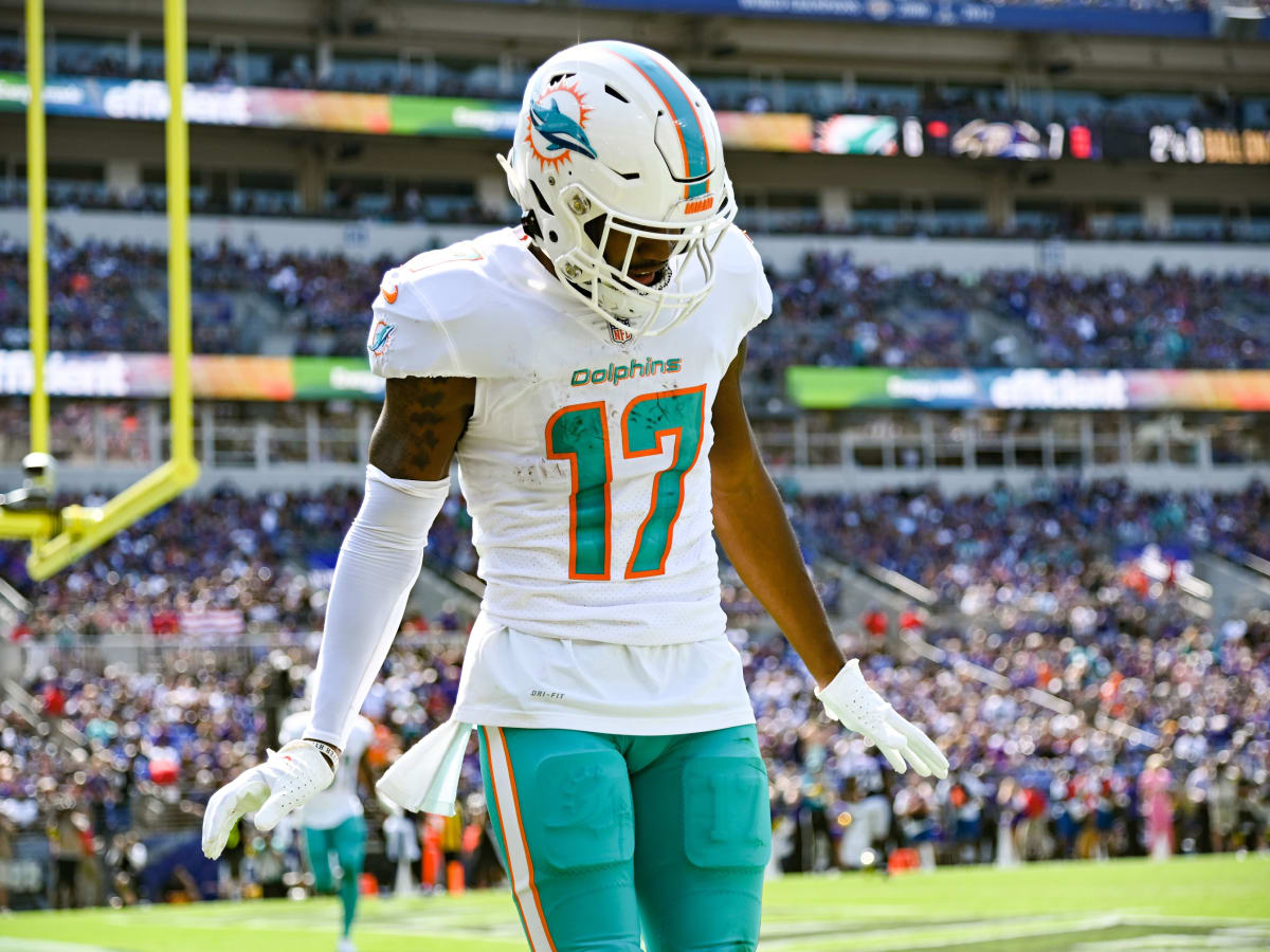 Miami Dolphins wide receivers Jaylen Waddle (17) and Tyreek Hill (10) walk  off the field during the second half of an NFL football game against the  New England Patriots, Sunday, Sept. 11