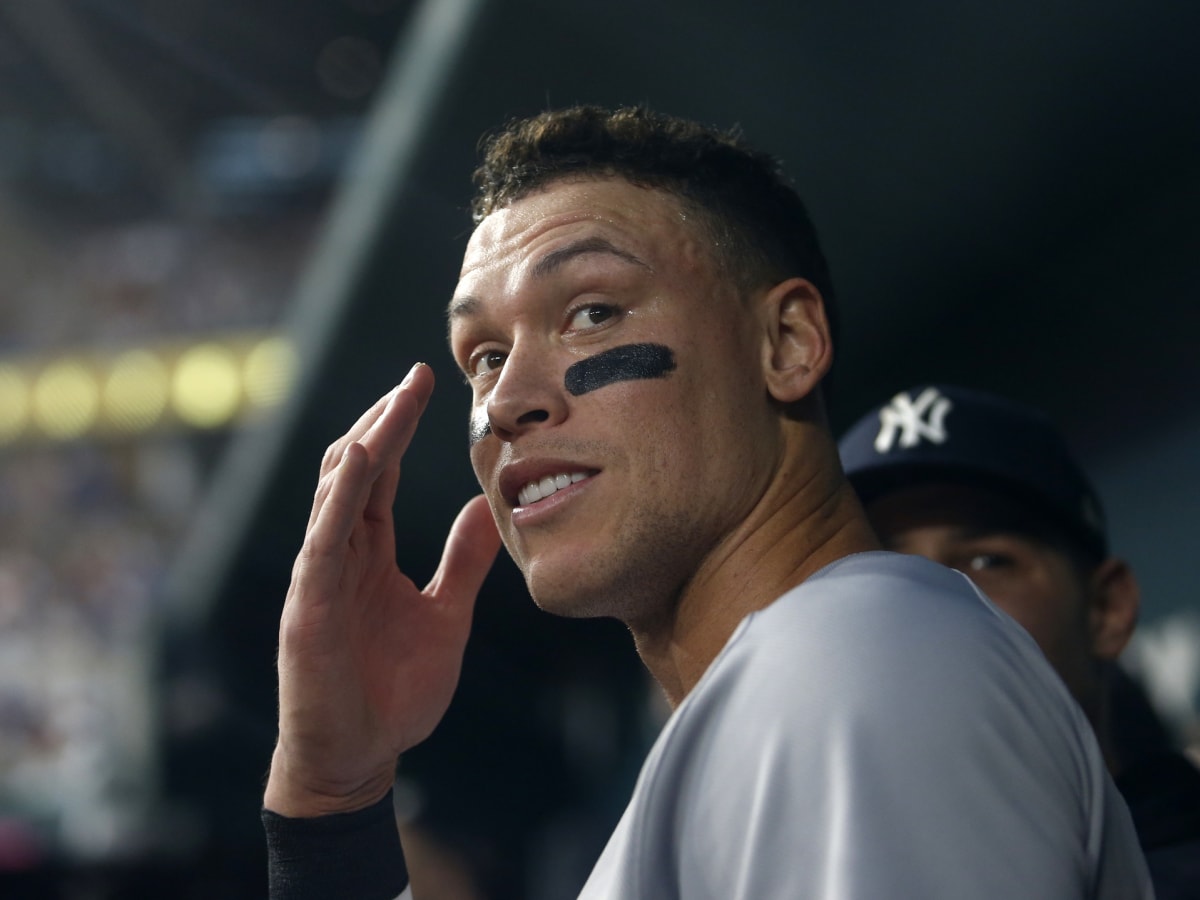 WATCH: Fan epically fails to grab Aaron Judge's 62nd HR after jumping  railing – NBC Sports Boston