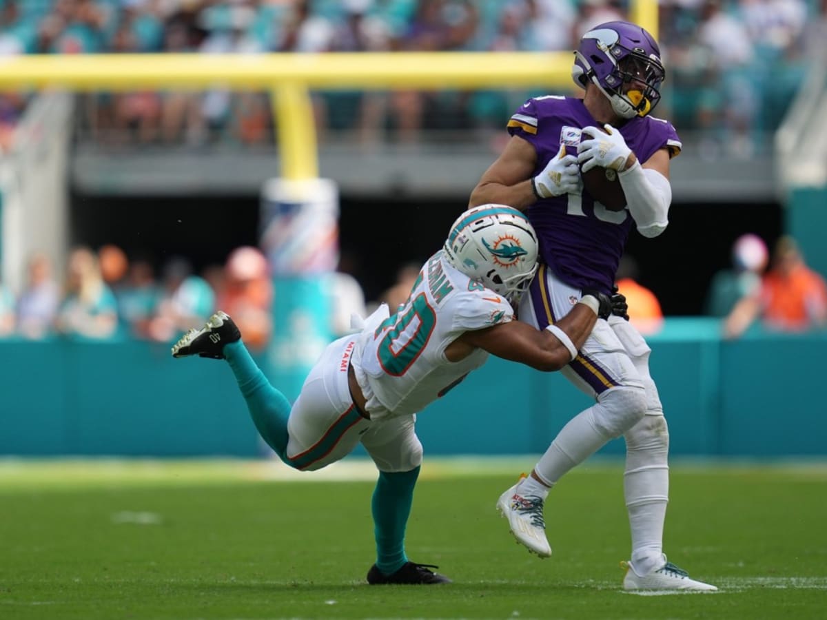 Miami Dolphins safety Nik Needham lays out for diving interception