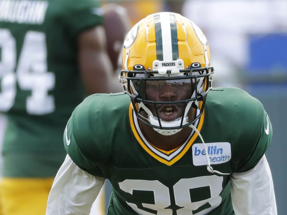 MIAMI GARDENS, FL - DECEMBER 25: Green Bay Packers safety Innis Gaines (38)  directs teammates as he