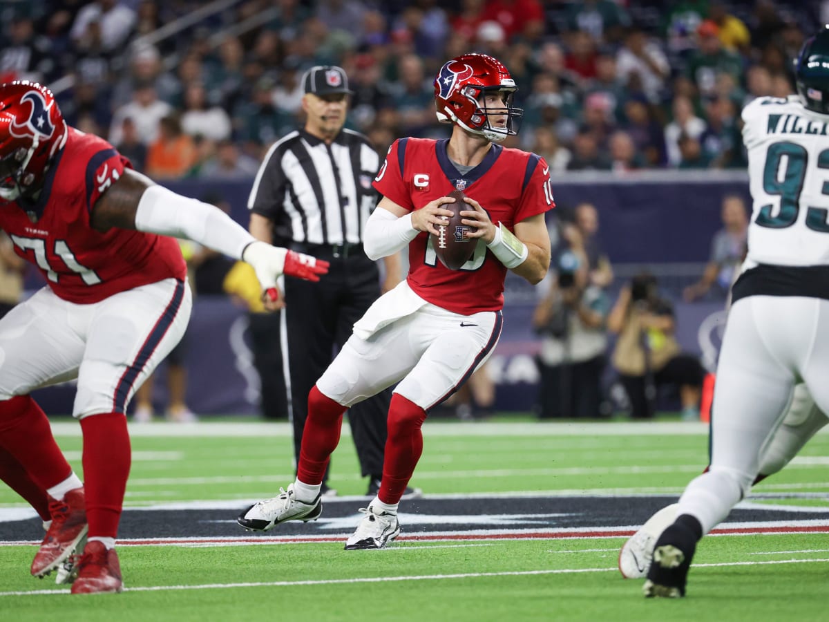 Houston Texans quarterback Davis Mills runs for a touchdown during