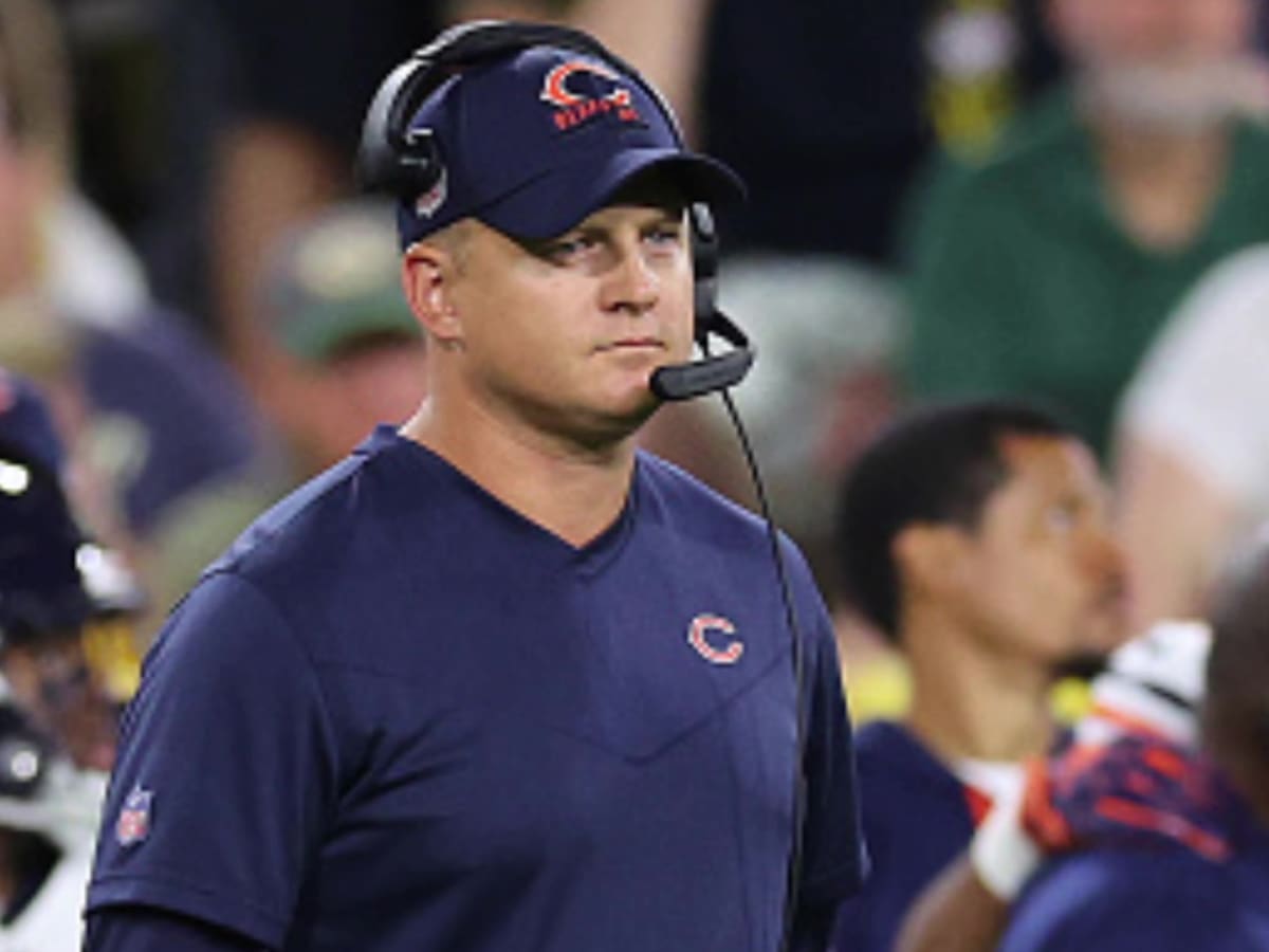 Chicago Bears offensive coordinator Luke G , left, talks to