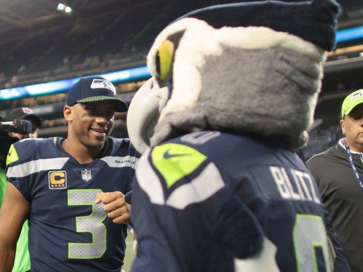 High Knees' Russell Wilson of Broncos Trolled by Seattle Seahawks Mascot  Blitz on Germany Trip - Sports Illustrated Seattle Seahawks News, Analysis  and More