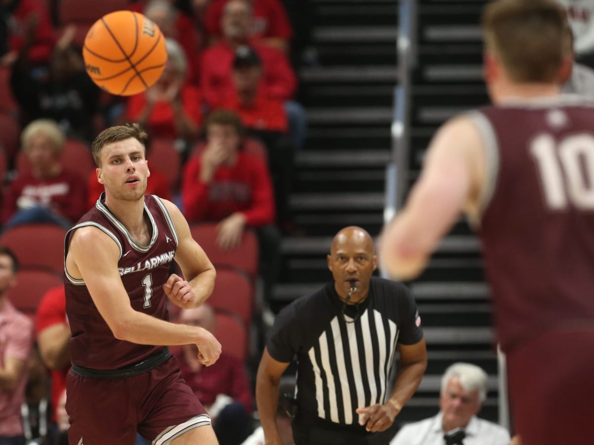 Bellarmine player wisely launches the ball down court to run the clock down  vs Louisville 