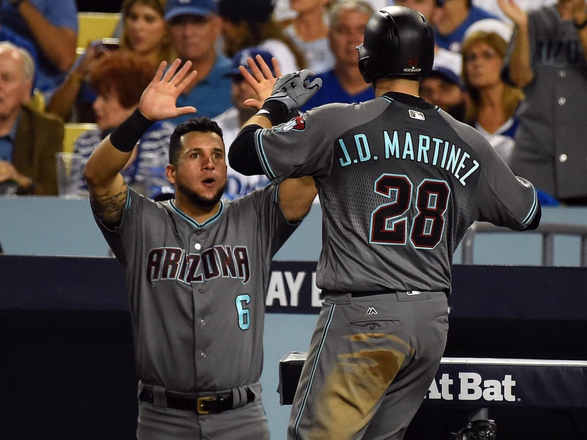J.D. Martinez exits first game as a Diamondback after being hit on