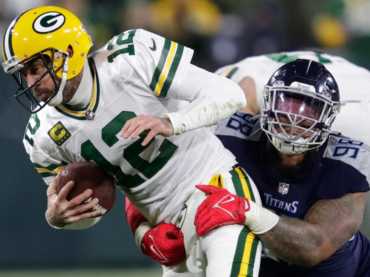 Aaron Rodgers throws 4 TD passes in the snow as the Green Bay Packers rout  the Tennessee Titans: Recap, score, stats and more 