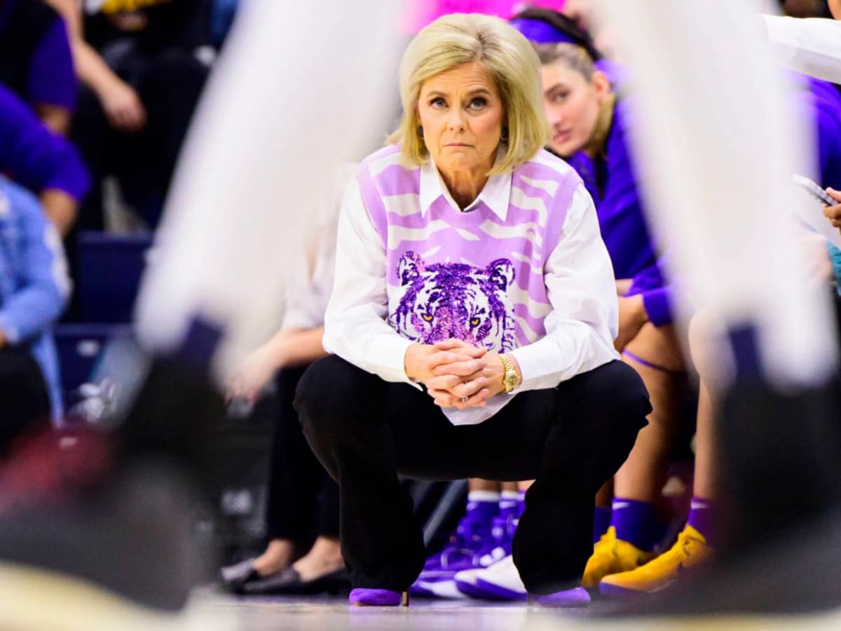 Angel Reese restrains LSU coach Kim Mulkey as fight with ref