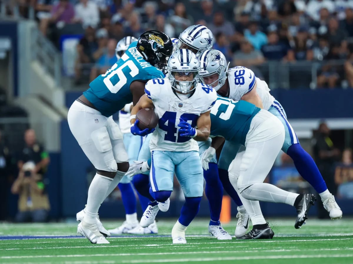 Dallas Cowboys running back Deuce Vaughn (42) scores a touchdown during an  NFL football game against the Jacksonville Jaguars, Saturday, Aug. 12,  2023, in Arlington, Texas. Jacksonville won 28-23. (AP Photo/Brandon Wade