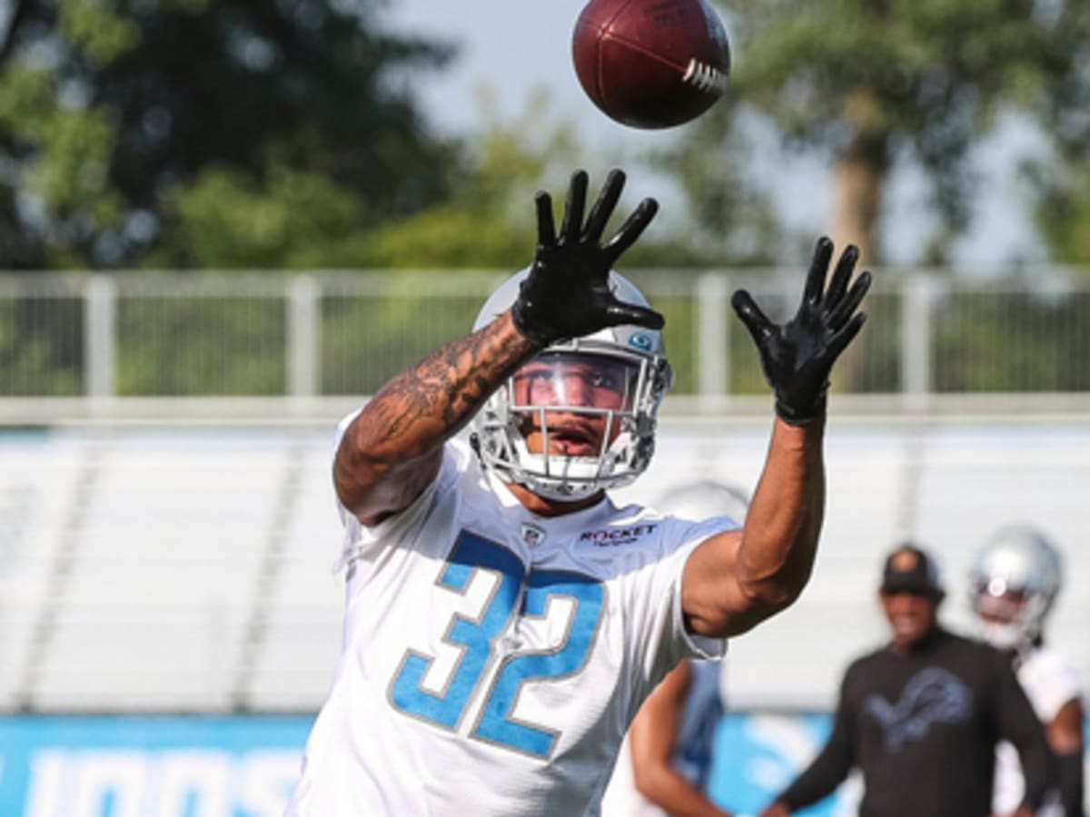 Detroit Lions safety Brian Branch (32) intercepts a pass intended