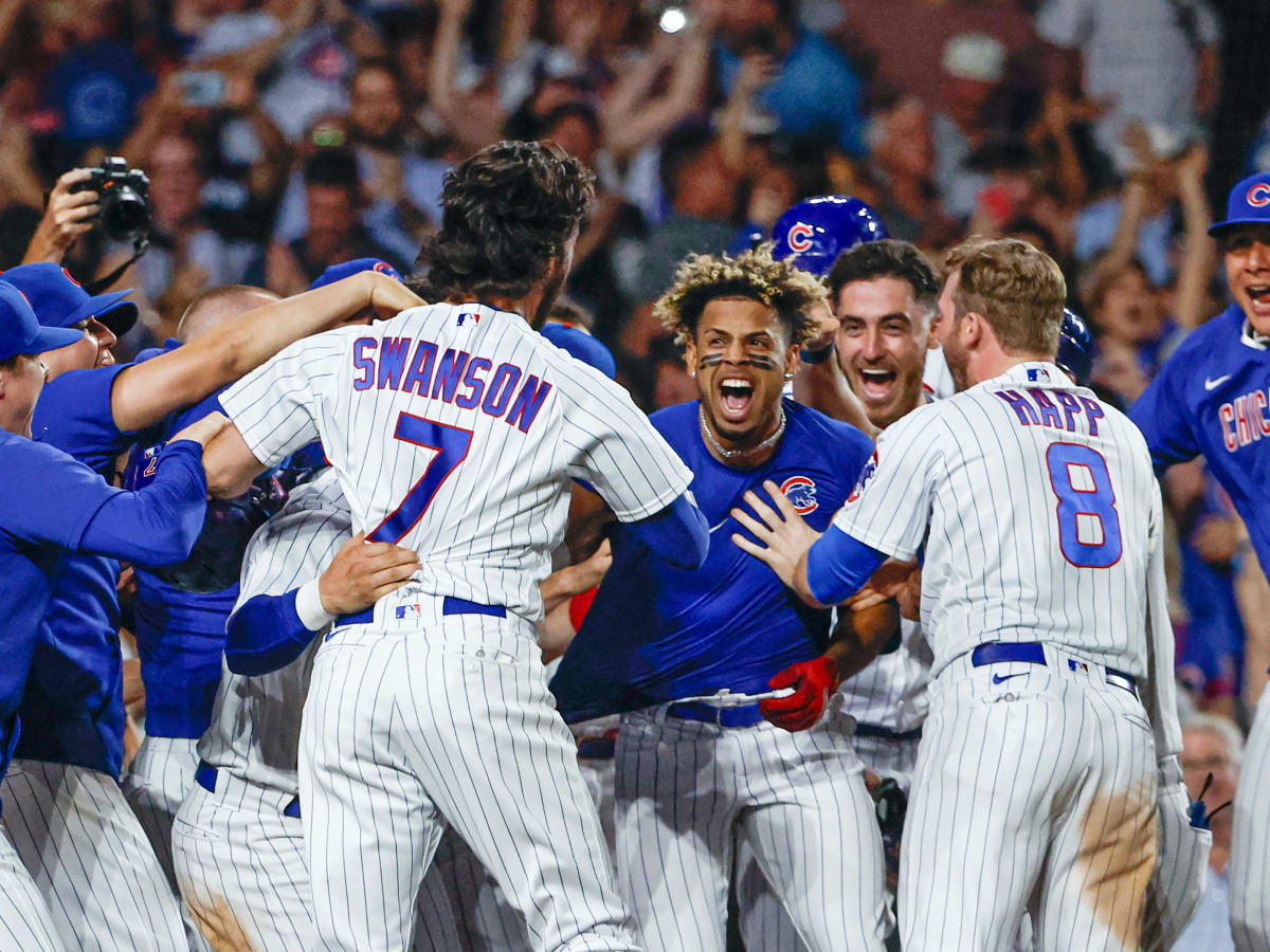 Chicago Cubs' Christopher Morel, left, celebrates his home run in