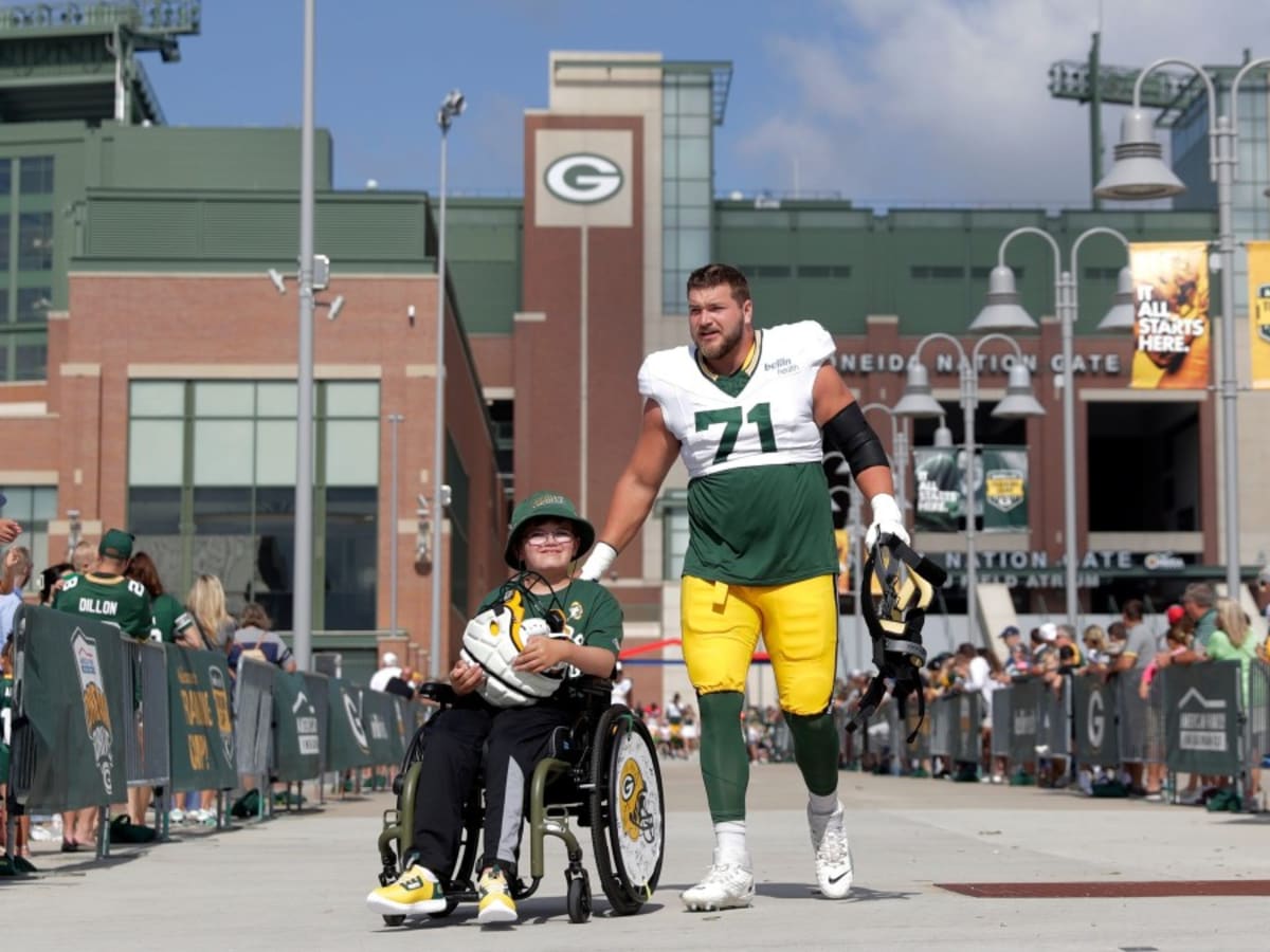 October 2, 2022: Green Bay Packers wide receiver Christian Watson (9)  warming up before the NFL football game between the New England Patriots  and the Green Bay Packers at Lambeau Field in