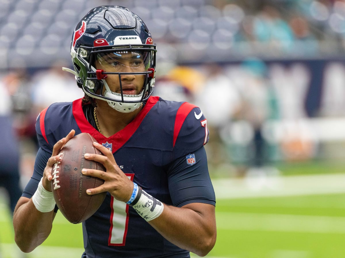 New Orleans, USA. 27th Aug, 2023. Houston Texans quarterback C.J. Stroud  (7) attempts a pass while facing a heavy pass rush from New Orleans Saints  defensive ends Tanoh Kpassagnon (92) and Carl