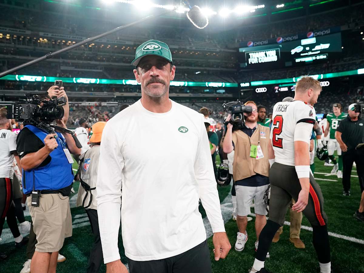 New York Jets quarterback Aaron Rodgers (8) calls out a play to his  teammates during the first half of an NFL preseason football game against  the New York Giants, Saturday, Aug. 26