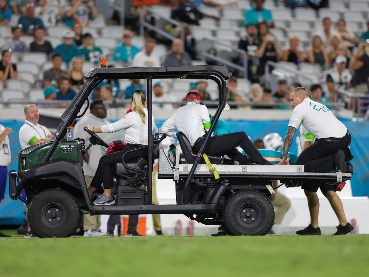 Daewood Davis: Miami Dolphins player 'has movement in all extremities'  after injury that led to suspension of game against Jacksonville Jaguars