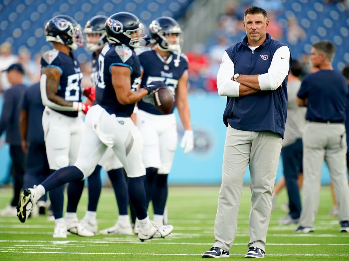 Tennessee Titans coach Mike Vrabel walks out of Friday's press conference