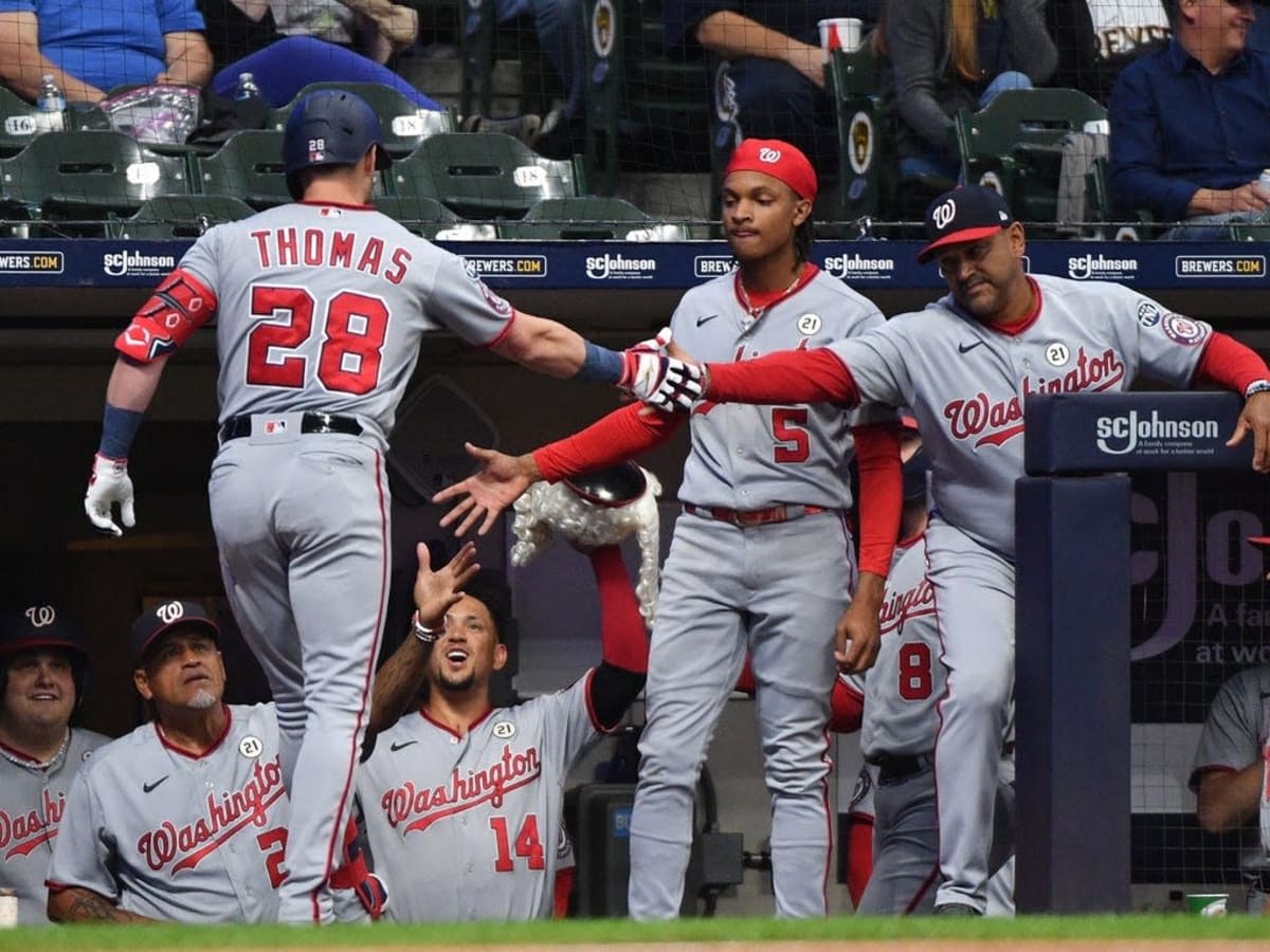 WASHINGTON, DC - SEPTEMBER 21: Atlanta Braves first baseman Matt Olsen (28)  connects for a home run during the Atlanta Braves versus Washington  Nationals MLB game at Nationals Park on September 21